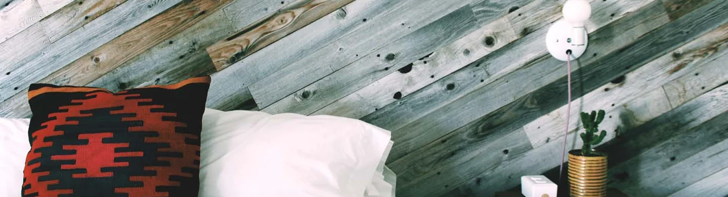 Image of Pillow on Bed in Amigo Motor Lodge Room
