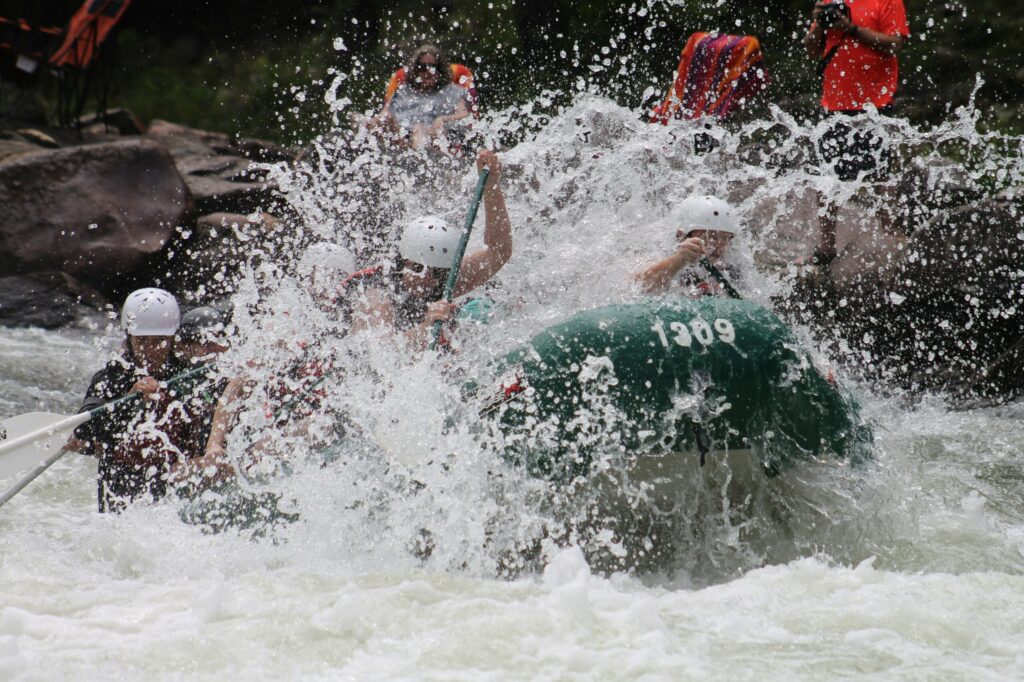People whitewater rafting